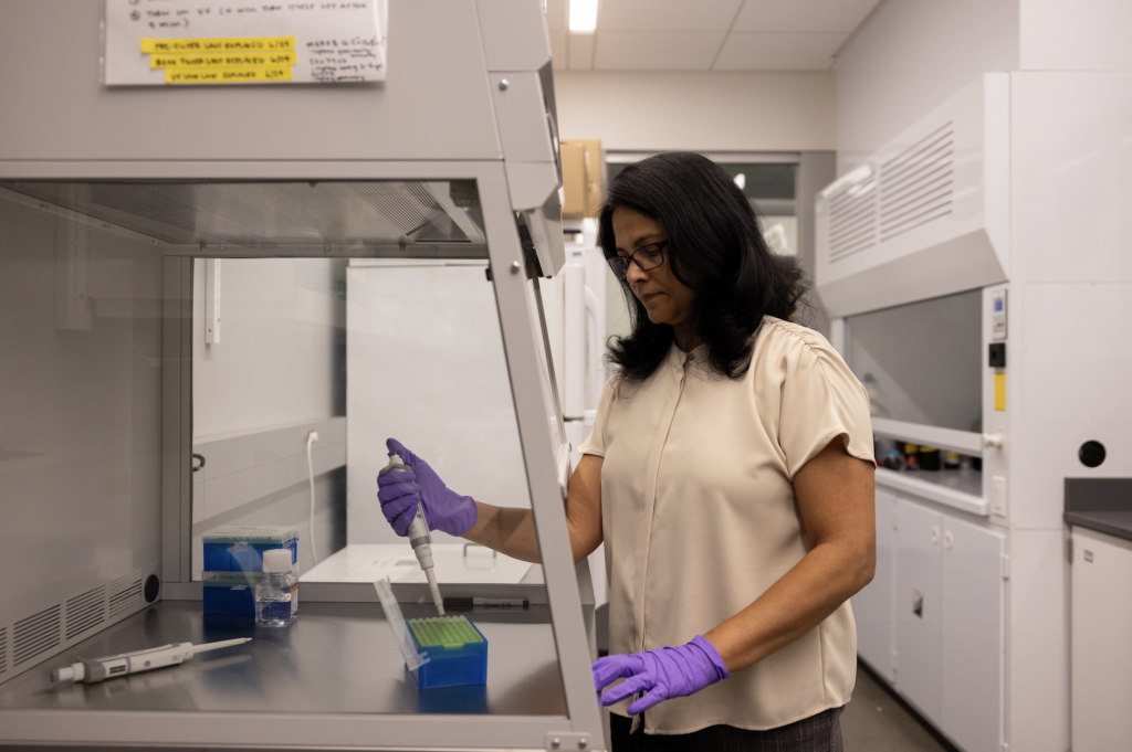 Jagadamma working in the lab